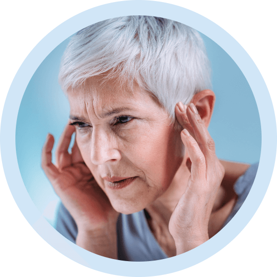 a woman looking for at home remedies for tinnitus